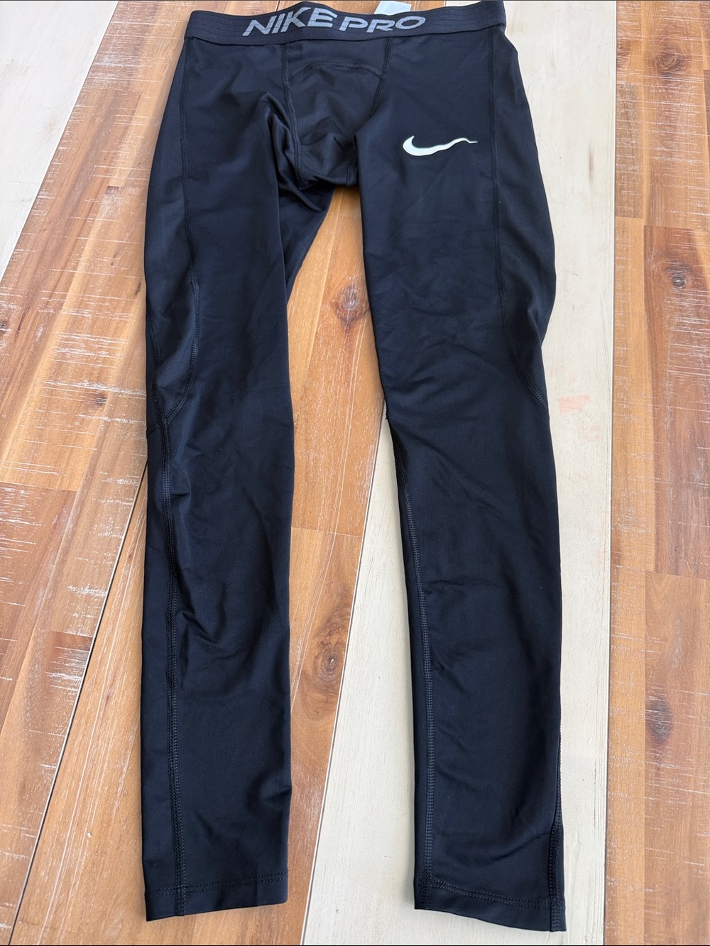 Nike Black Compression Leggings with White Swoosh
